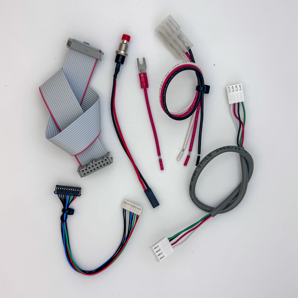 custom wire harness assemblies including ribbon cables, push-button harnesses, crimp terminals, and multi-connector solutions by journey electronics